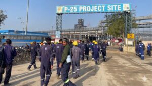 Thousands of workers queue up every morning, including on Sundays, outside the refinery gate at Panipat, March 2026. Anumeha Yadav/The Migration Story